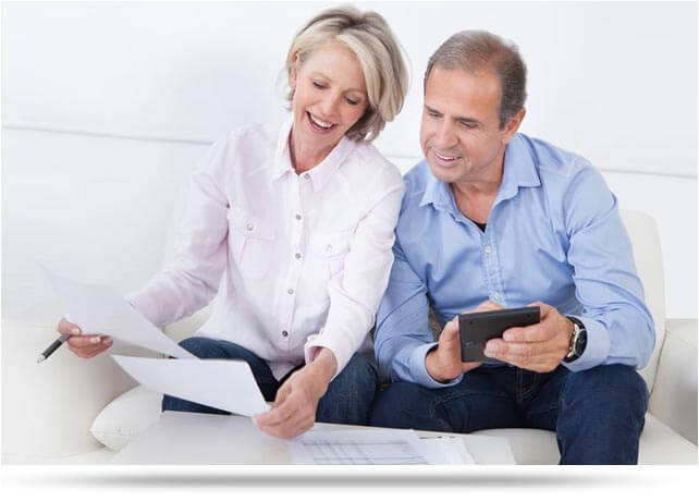 Couple going over mortgage refinancing terms 